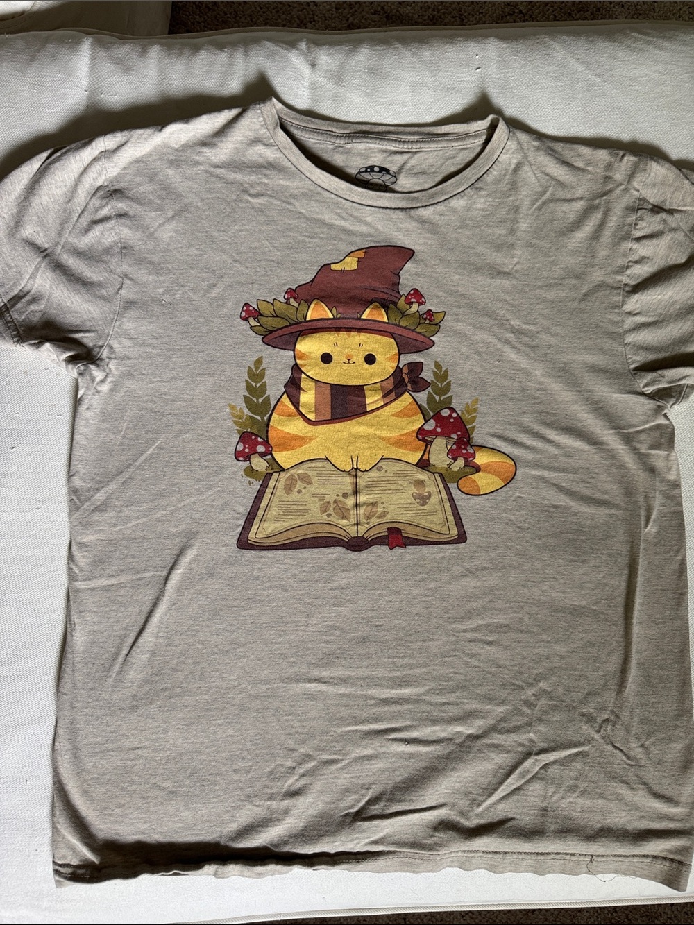 Hot Topic Cream Kids Tee with Yellow Cat Wizard Graphic